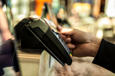 Credit card terminal where people tap to pay with credit card